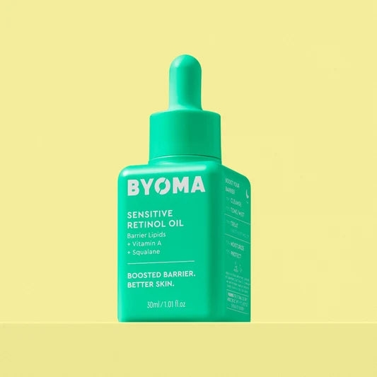Un flacon vert de BYOMA Sensitive Retinol Oil avec compte-gouttes.